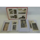 Three albums containing approximately 100 photographs and postcards.