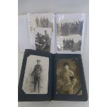 Two albums of approximately 200 mainly WW1 postcards and photographs.