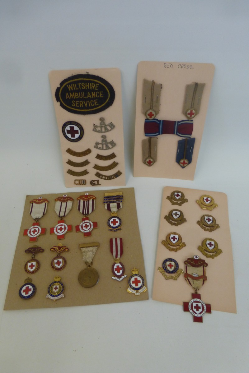 Red Cross medals and badges.