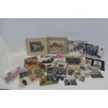 A quantity of mainly military photographs.