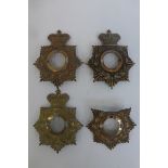 Four Victorian helmet plates, one A/F.