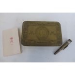 A WW1 Princess Mary tin with pencil and Christmas card.