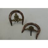 A pair of WW1 trench art Royal Artillery lucky horseshoes, one A/F.