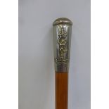 A Royal Corps of Signals swagger stick.