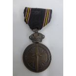 A Belgian Prisoner of War Medal.