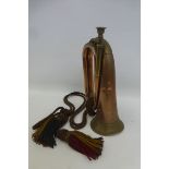 A 1915 military marked copper and brass bugle by Boosey & Co.