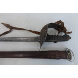 An Edward VII army officer's sword by Wilkinson in its leather scabbard with leather sword knot.