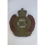 A cast brass Royal Engineer's door badge.
