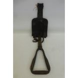 An Argentinean military entrenching tool with a black leather carry case.