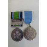 A Battle for Britain medal with Home Guard and Local Defence Volunteers clasps and a 40th