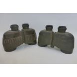 A pair of Steiner (West German) military binoculars with a similar pair.