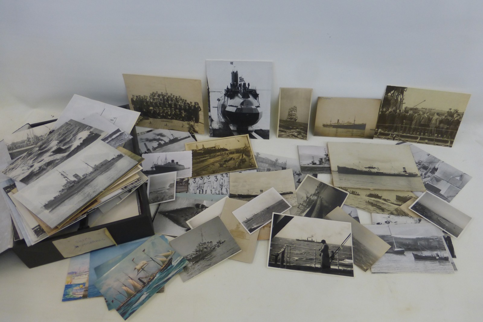 A box of ship's photographs including WW2 submarines.