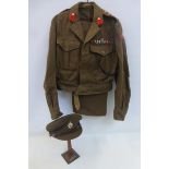 A 1953 pattern Notts & Derby Regiment army colonel's uniform (jacket, trousers and cap).