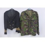 A Royal Navy Lieutenant Commander's mess jacket with a Royal Navy Bomb Disposal camo jacket.