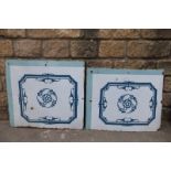 Two decorative enamel sign splashbacks.