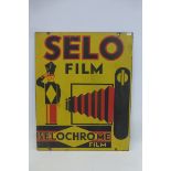 A Selo Film part pictorial double sided enamel sign in good condition, 16 x 20".