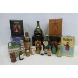 Five boxed Bell's whisky decanters and various whisky bottles etc.