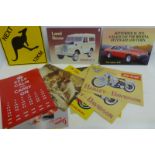 Thirteen reproduction tin advertising signs including Vespa, Harley Davidson etc.