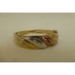 A 9ct gold tri-coloured bracelet, approximate weight 16.2g.