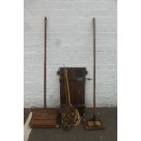 An oak Ewbank carpet sweeper, a floor buffer, a trouser press and two cane carpet beaters.