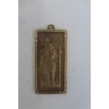 A 9ct gold St. Christopher, approximately 16g.