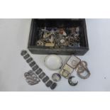 A box of silver jewellery including a bangle.