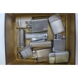 A collection of ten assorted pocket lighters including three Ronson Typhoon, an Orlik Matchless