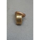 A 9ct gold band with engraved decoration and a 9ct gold wedding band, approximately 8.1g.