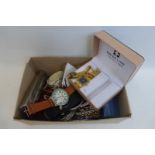 A box of assorted costume jewellery including watches.