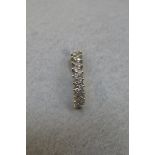 A 9ct white gold and diamond ring size M.