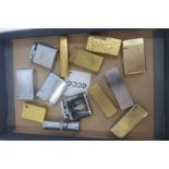 A collection of 13 assorted pocket lighters including Dunhill, Win, Ronson etc.