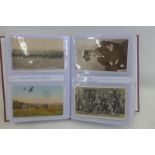 An album of 200 mainly WWI military postcards, silks and Field Post Office envelopes.