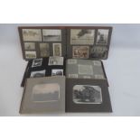 Three albums containing approximately 200 mainly WWII photographs.