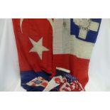 An original Turkey flag approximately 49 1/4 x 106 1/4", made by John Eddington of London, with four