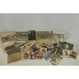 A large quantity of genuine military photographs and postcards.