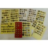 A large quantity of mainly military buttons including Victorian Regiments, mounted on ten cards.