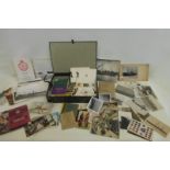 A large quantity of assorted military postcards, photographs and Christmas cards.