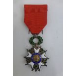 A French Legion d'Honneur medal.