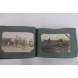 An album of approximately 100 mainly WWI military photographic postcards including 45 WWI Imperial