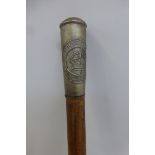 A Tanganyka Prisons wooden shafted swagger stick, approximately 24 3/4" overall length.