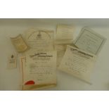 A collection of nine certificates contained in a cardboard tube all awarded to Miss Esme Wadmore who