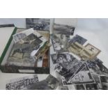 A box of approximately 50 reproduction and genuine military photographs, mainly mounted on card.