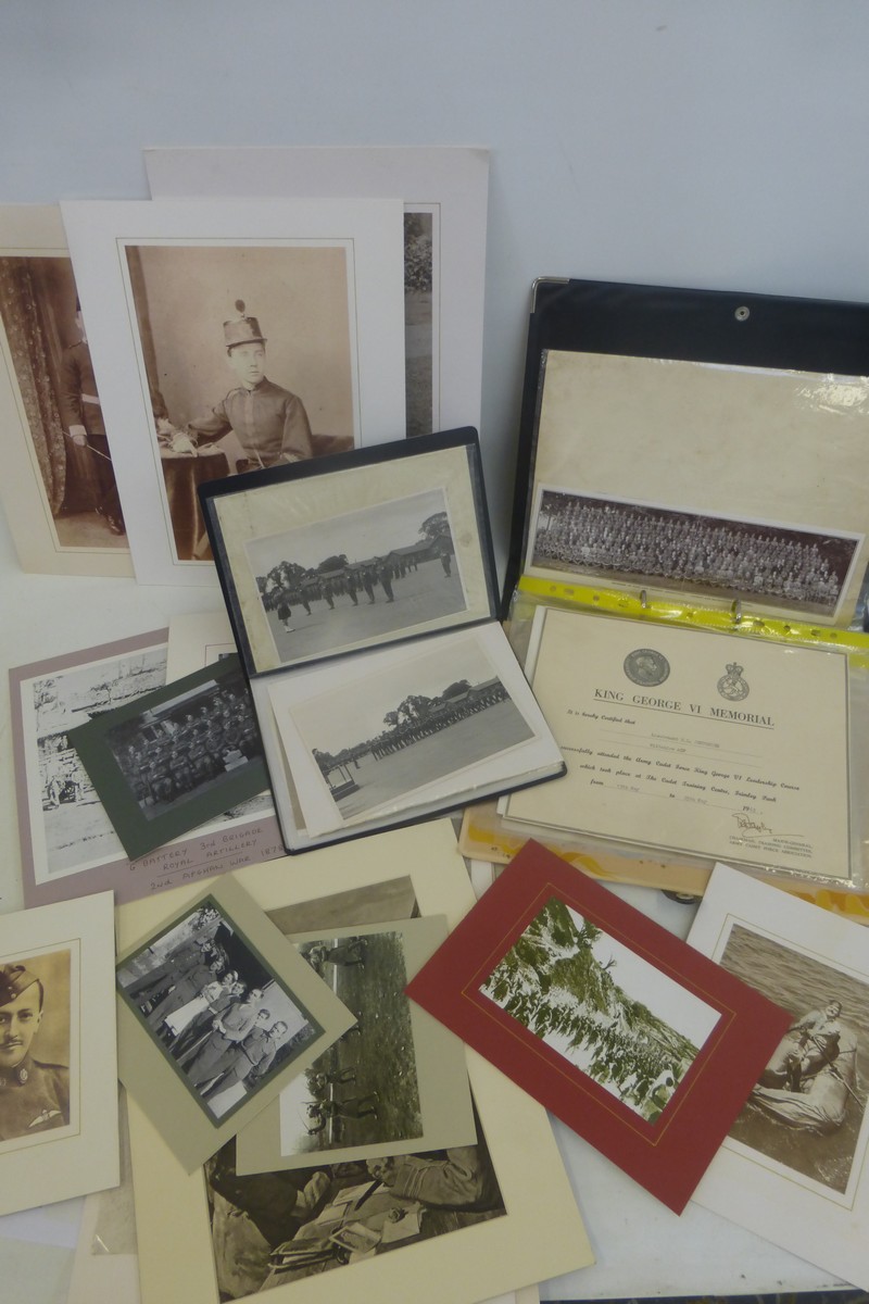 Two albums of military photographs and ephemera, with some reproduction military photographs mounted