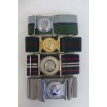 Four stable belts with metal buckles, British and foreign.