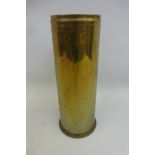 A 1916 German brass shell case approximately 9" by 3 1/2" diameter, marked POLTE MAGDEBURG 1916 to