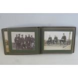 An album of 33 late Victorian photographs mainly military.