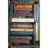 A box of assorted Folio Society volumes.
