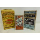 Three oversized shop display dummy cigarette boxes advertising different brands of Wills