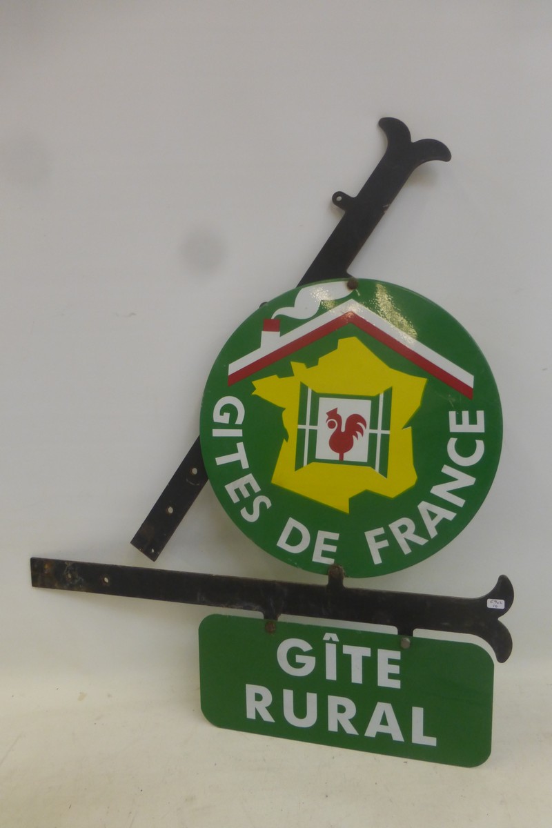 A "Gites de France" double sided two piece enamel sign on retail bracketry.