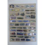 A card of 49 railway badges, mostly named locomotives, diesel and steam.